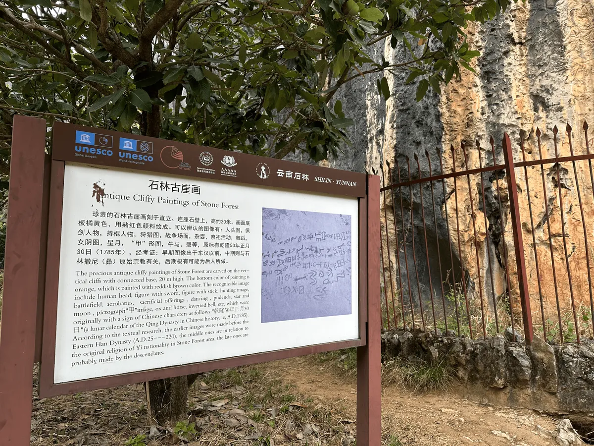 Sign for the cliff paintings reads Cliffy